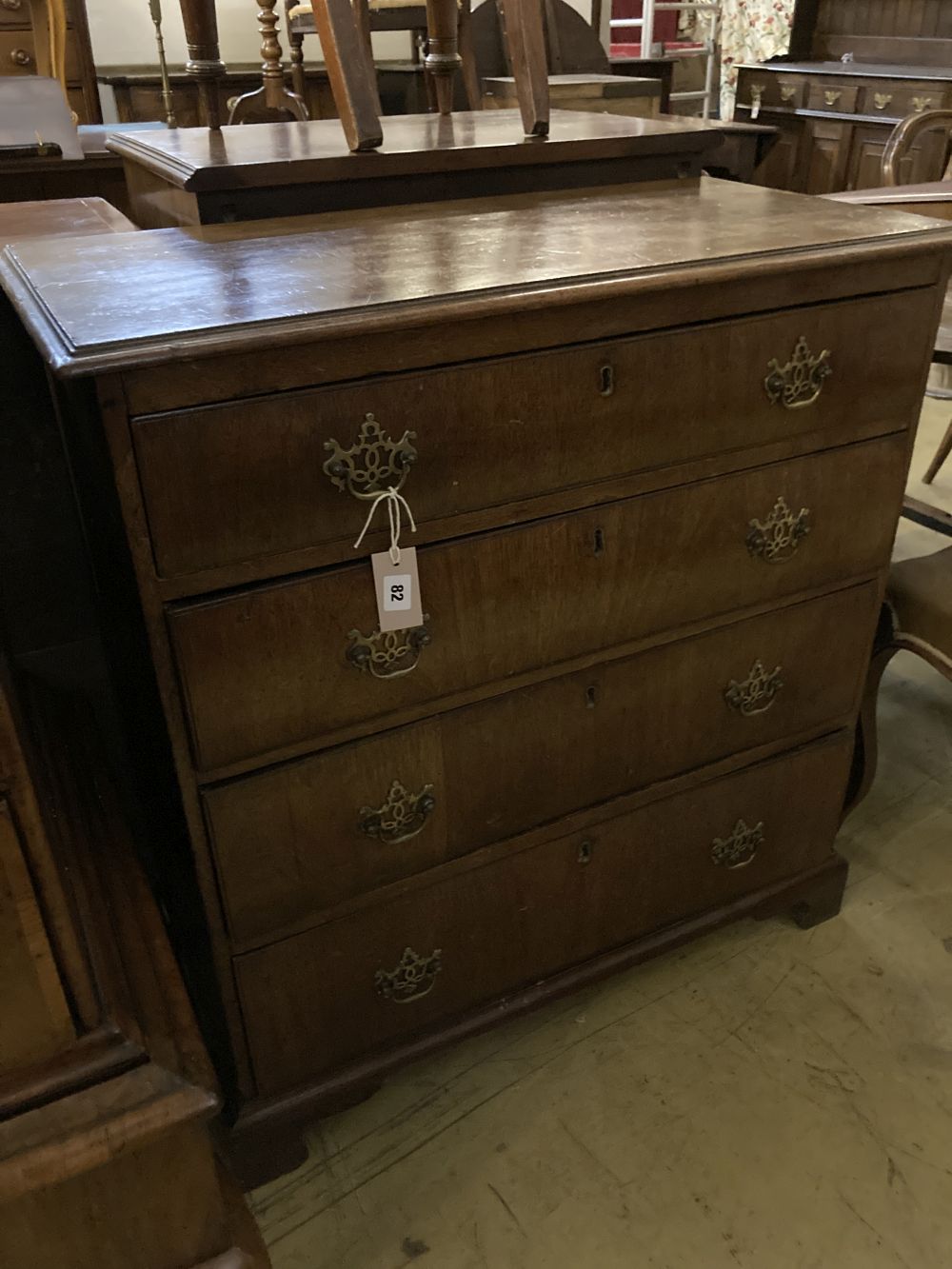 A small George III mahogany chest, width 82cm, diameter 41cm, height 87cm